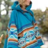 Kelly Reilly Yellowstone Beth Dutton Blue Coat side Pose