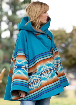 Kelly Reilly Yellowstone Beth Dutton Blue Coat side Pose