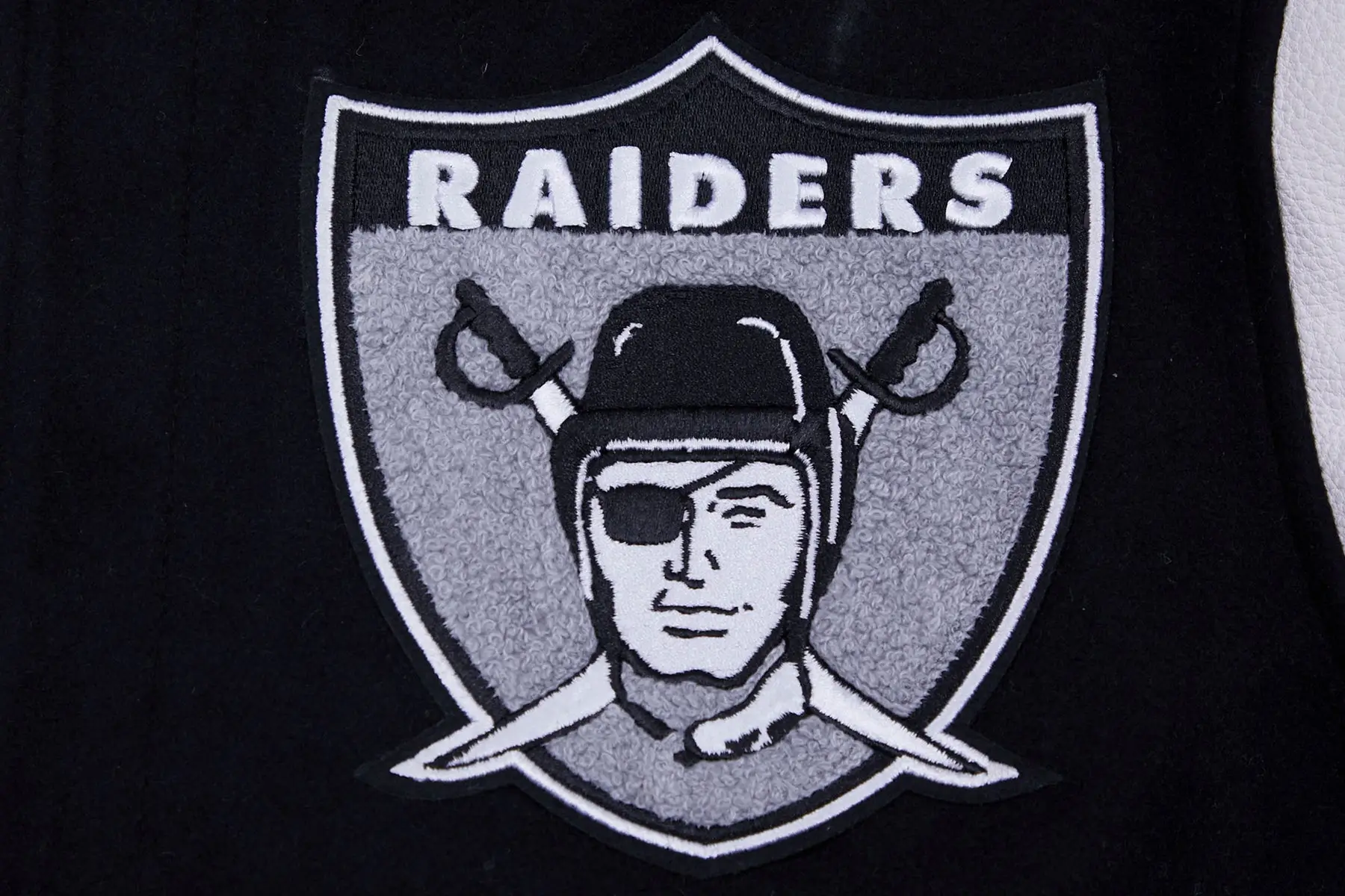NFL Las Vegas Raiders Pro Standard Logo Classic Black & White Varsity Jacket - Image 9