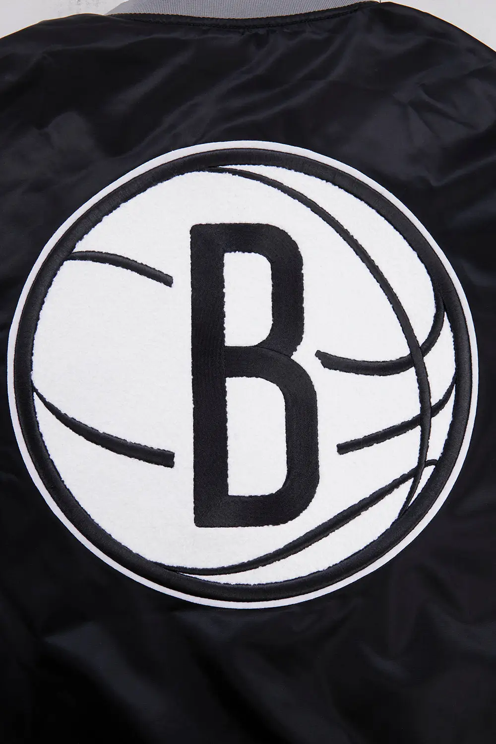Brooklyn Nets Retro Classic Rib Satin Varsity Jacket - Image 7