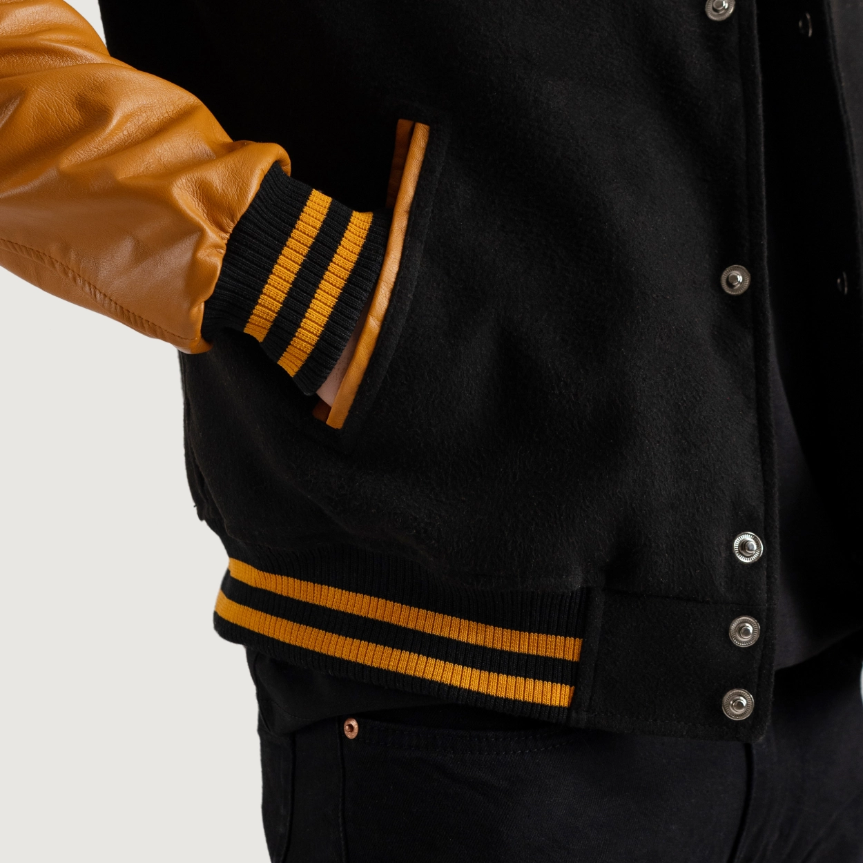 Black and gold varsity letterman jacket 1