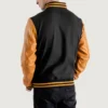 Black and gold varsity letterman jacket