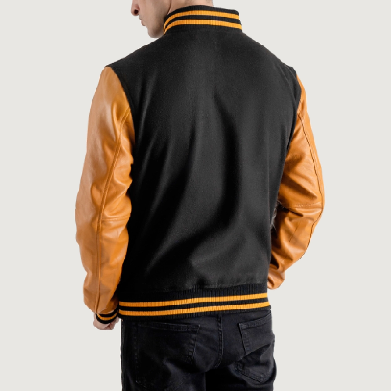 Black and gold varsity letterman jacket