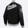 Brooklyn nets pro standard script tail black varsity jacket 3