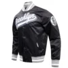 Brooklyn nets script tail full snap satin varsity jacket black 6