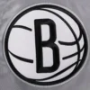 Brooklyn nets script tail full snap satin varsity jacket gray 1