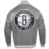 Brooklyn nets script tail full snap satin varsity jacket gray 5