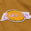 La lakers browncream dusted varsity logo