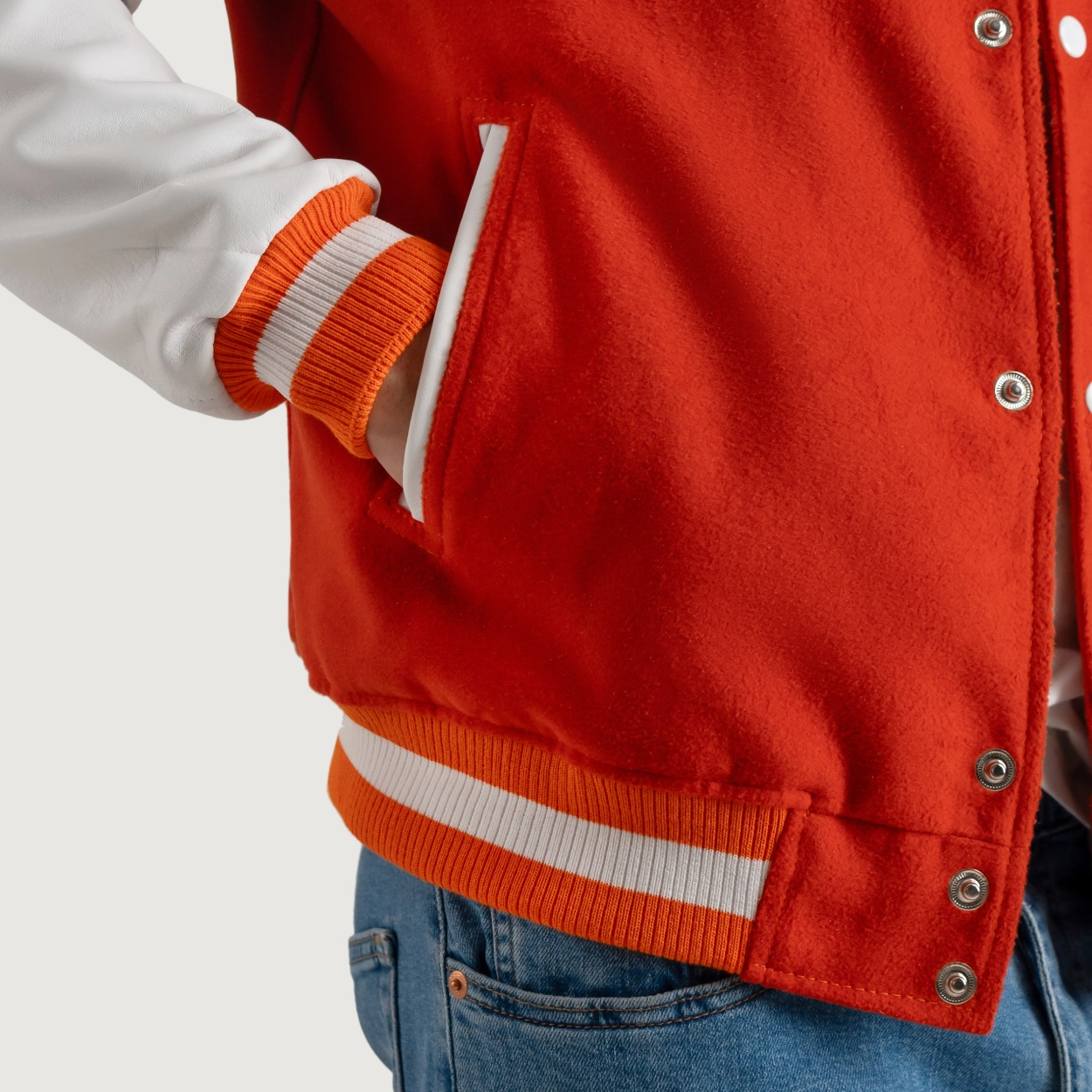 Orange and white varsity letterman jacket