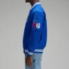 Philadelphia 76ers full snap blue satin varsity side view