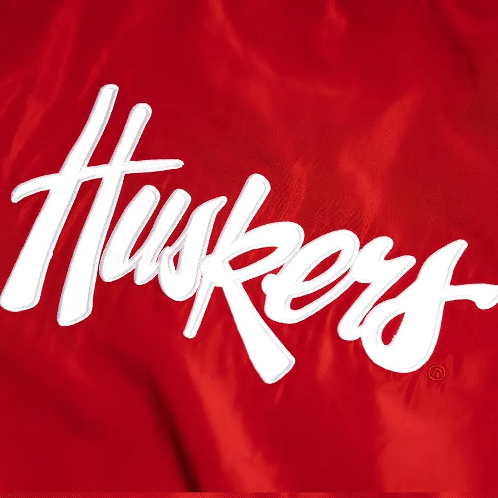 Nebraska cornhuskers script logo bomber red satin varsity jacket 1